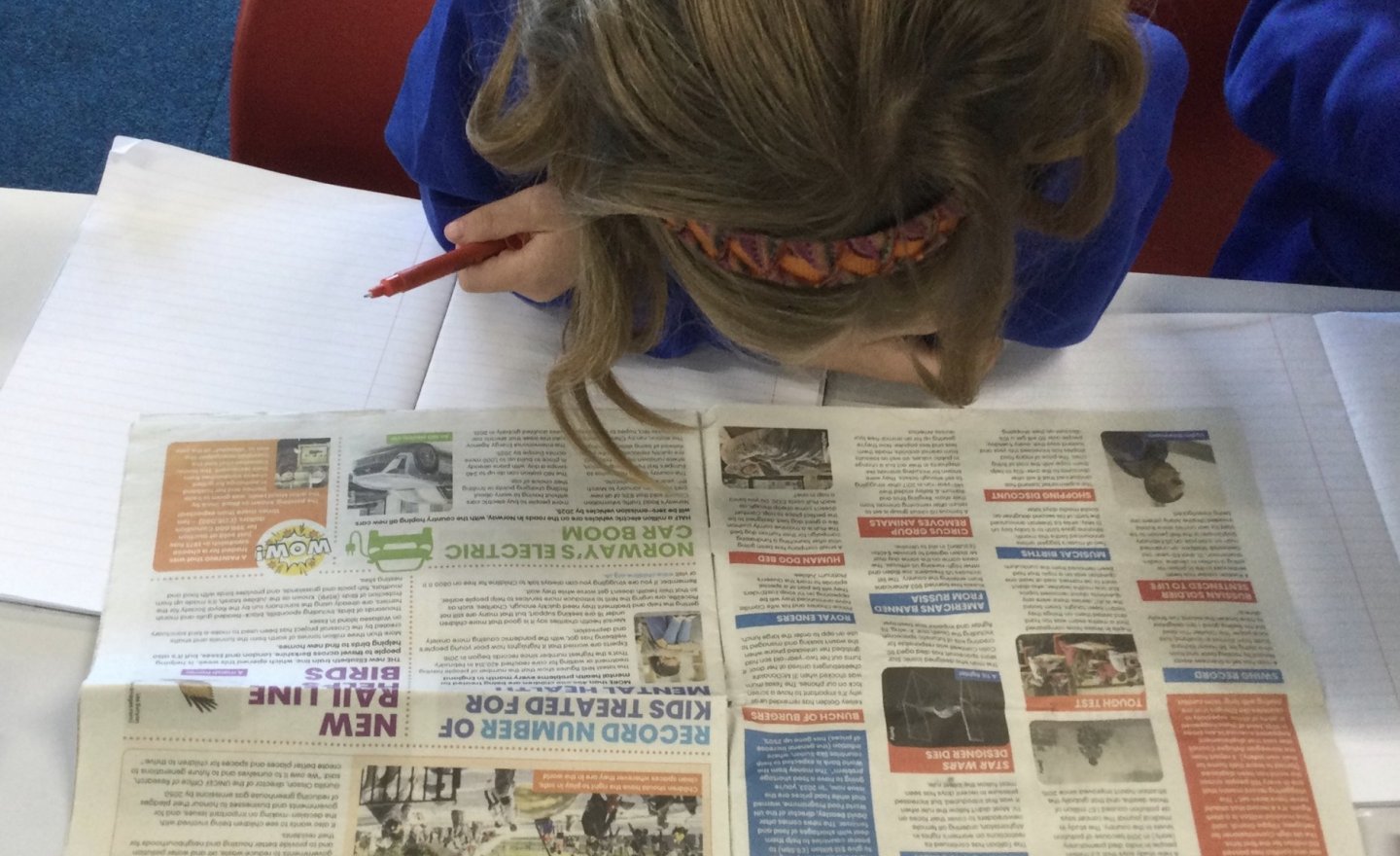 Image of Reading the paper
