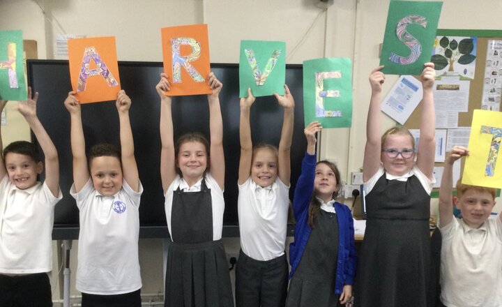 Image of Eco council bring in the Harvest!