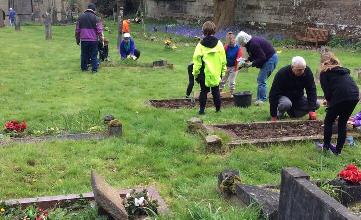 Image of Anson Eco and Worship Council help tidy St Stephen's churchyard.