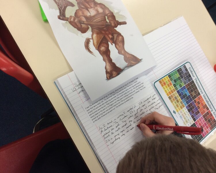 Image of Our Minotaur Writing 