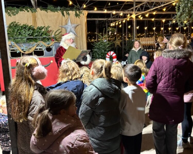 Image of Anson choir sing at Canalside and enjoy a special Christmas treat!