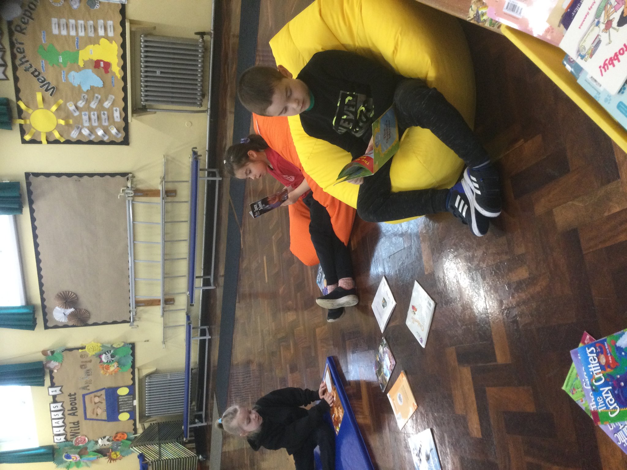 Image of Class 2 absorbed in reading