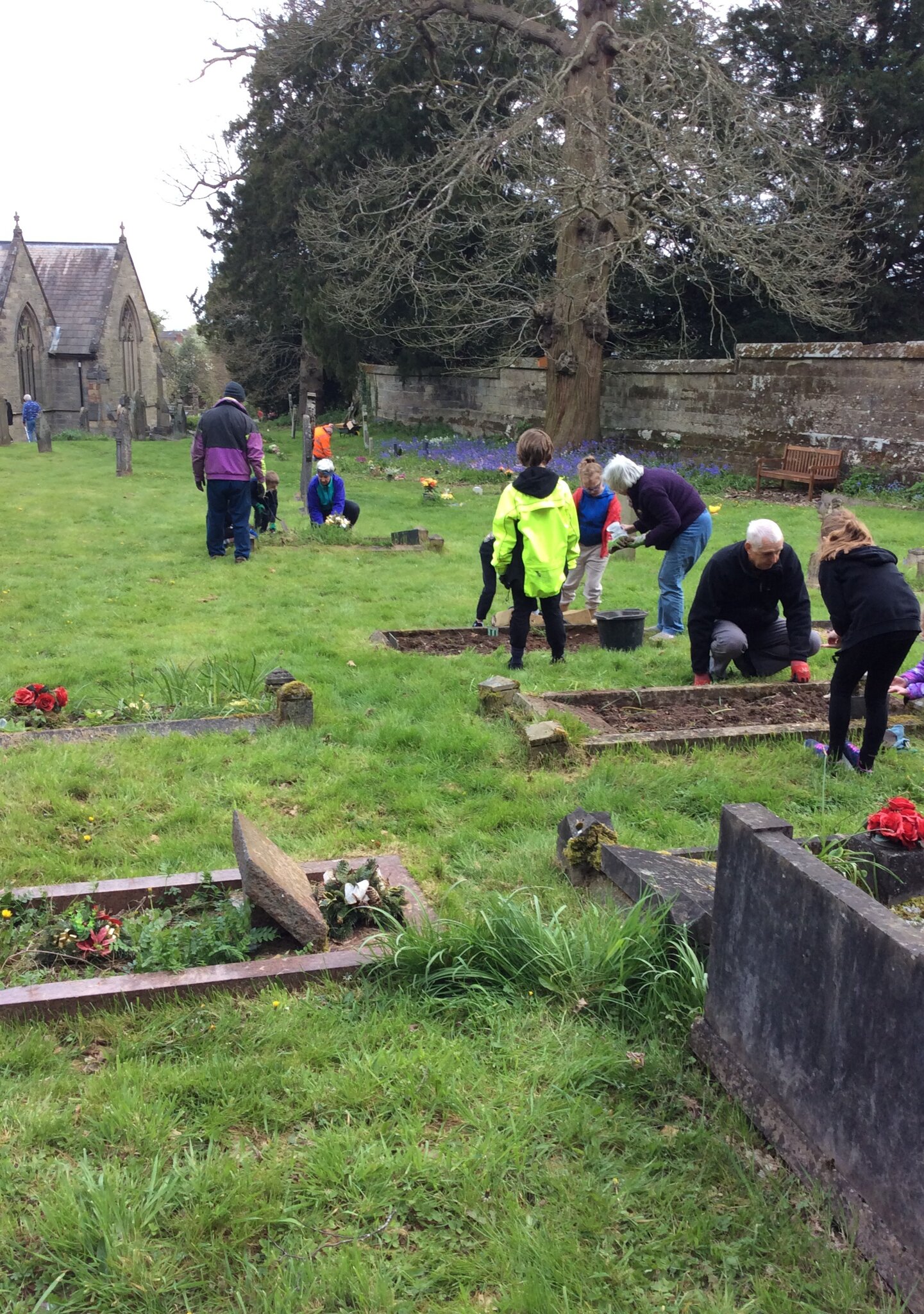 Image of Anson Eco and Worship Council help tidy St Stephen's churchyard.