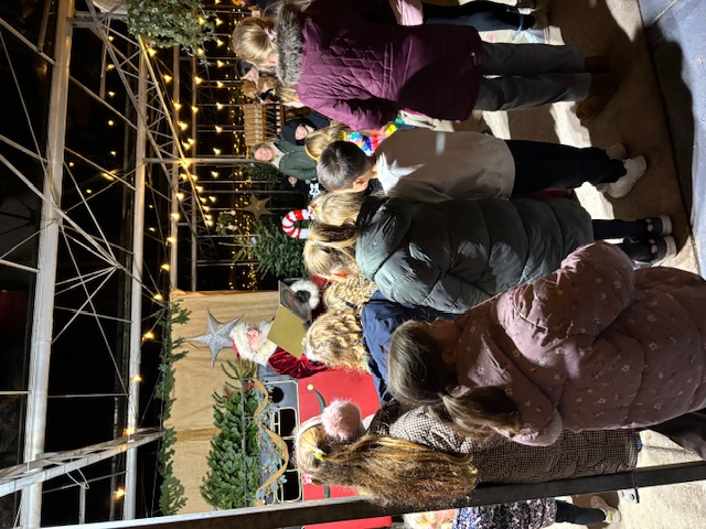 Image of Anson choir sing at Canalside and enjoy a special Christmas treat!