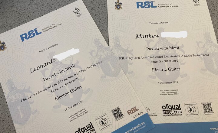 Image of Congratulations to two pupils on passing their electric guitar exams