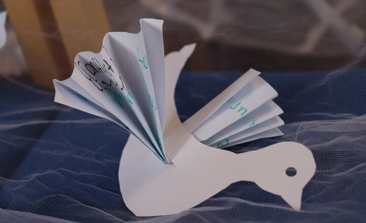 Image of Pupils in key stage 3 create paper doves to represent peace