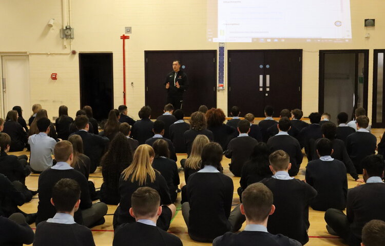 Image of Mr Gray talks to year 10 pupils about work experience