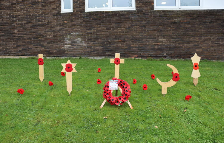 Image of Year 9 pupils lead Collective Worship on the theme of Remembrance