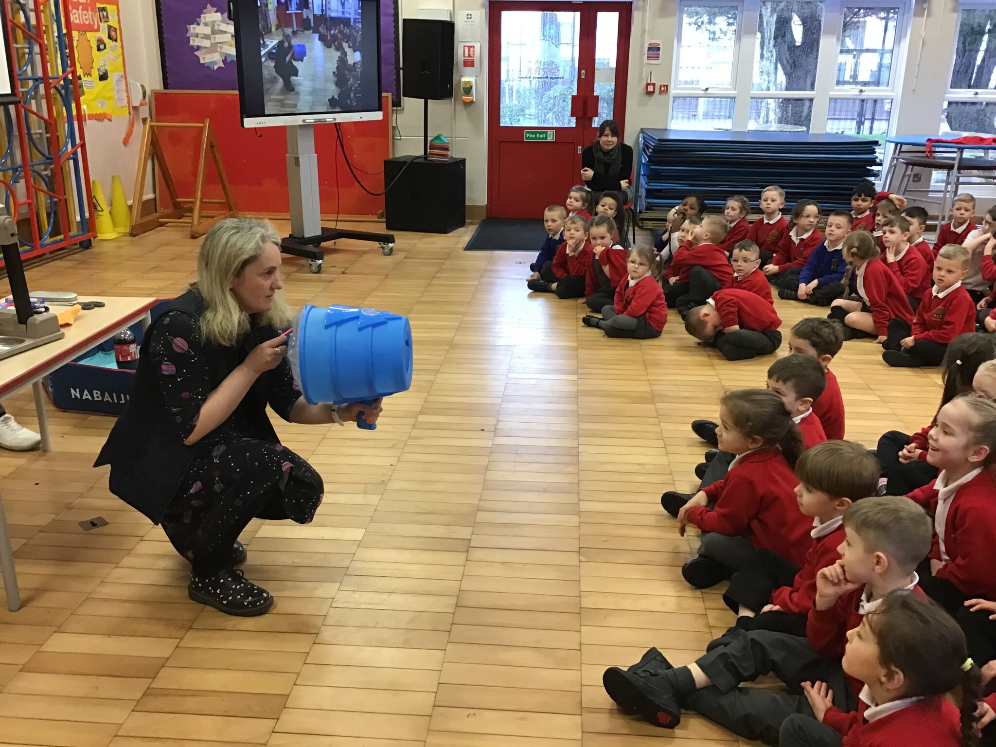 Image of Miss Walsh launches British Science Week at Grange Primary School with a special, whole school science show