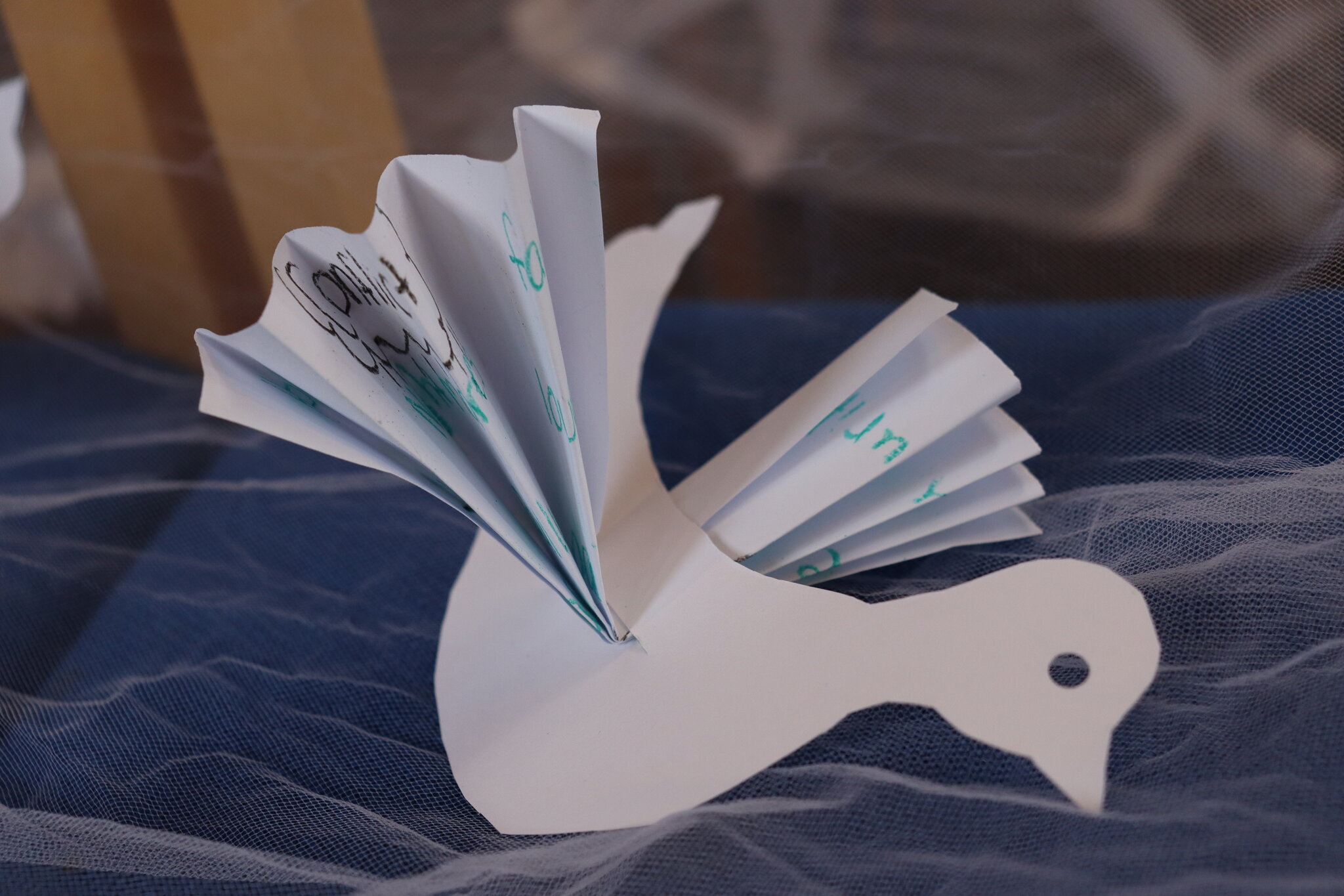 Image of Pupils in key stage 3 create paper doves to represent peace