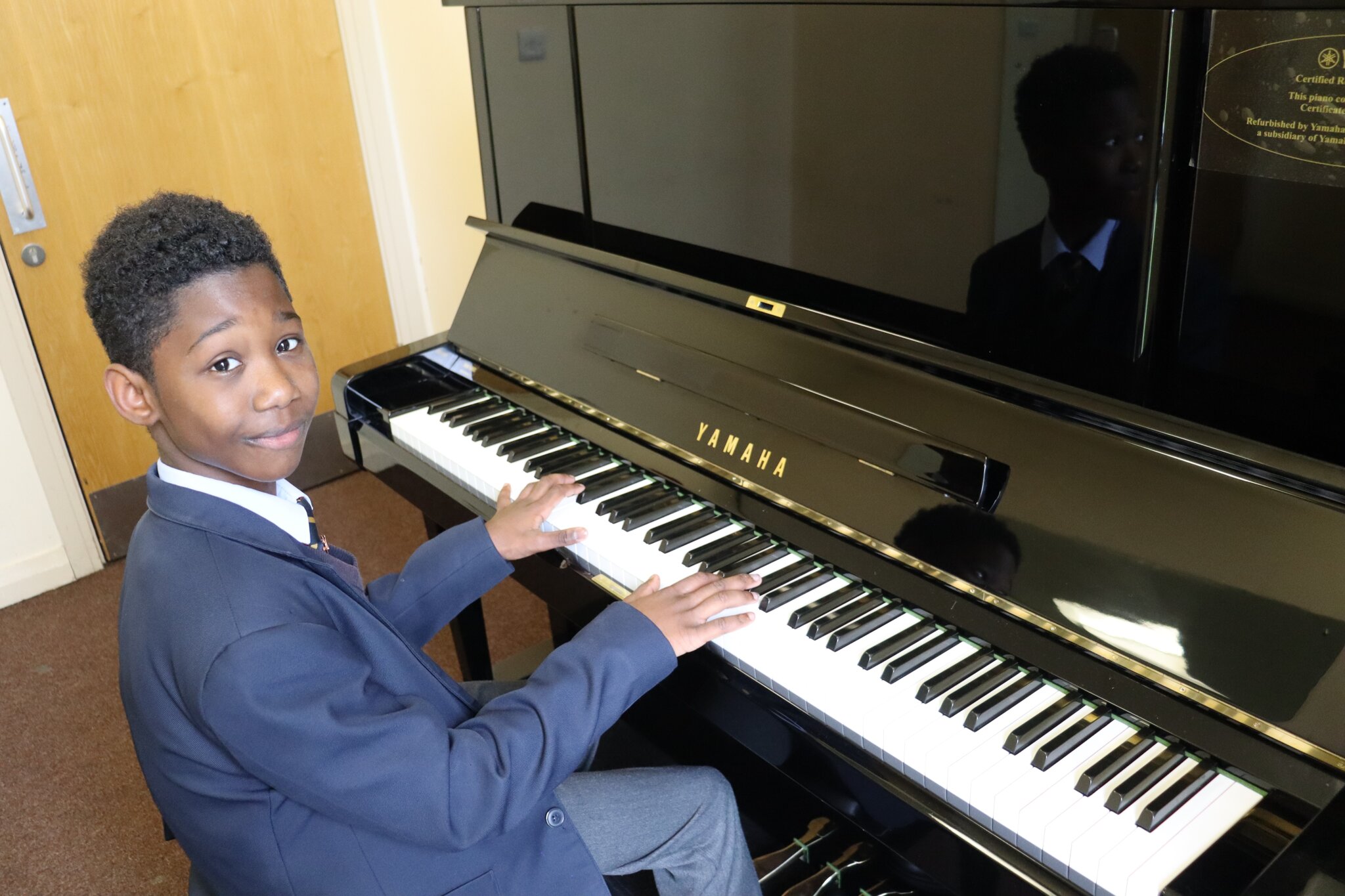 Image of Music Department celebrates the delivery of a beautiful, new piano