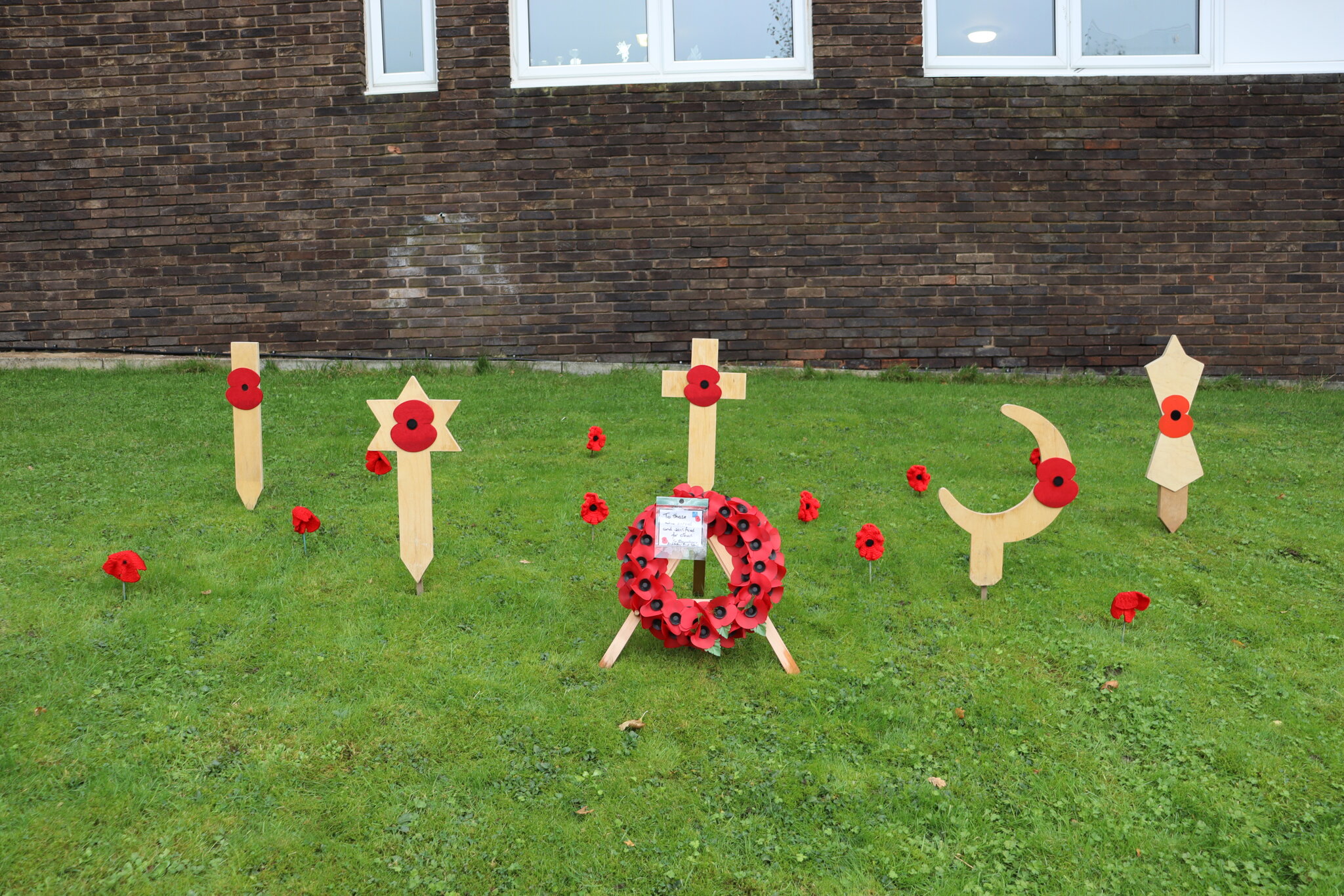 Image of Year 9 pupils lead Collective Worship on the theme of Remembrance