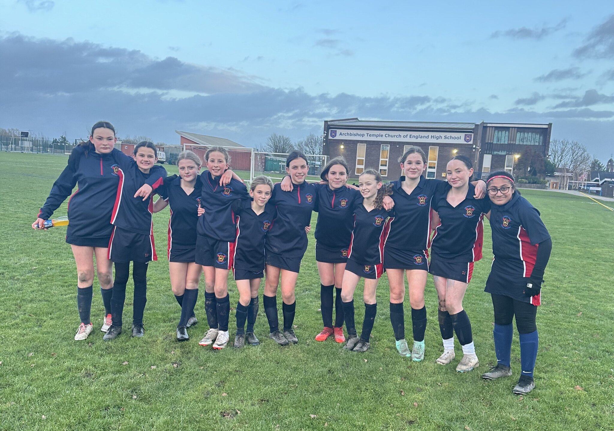 Image of Year 7 girls football team celebrate reaching the national quarter final