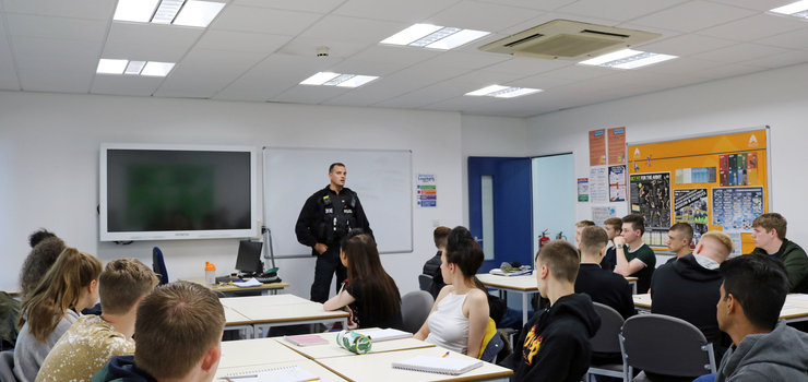 Image of Police Officer Visits Public Services Students