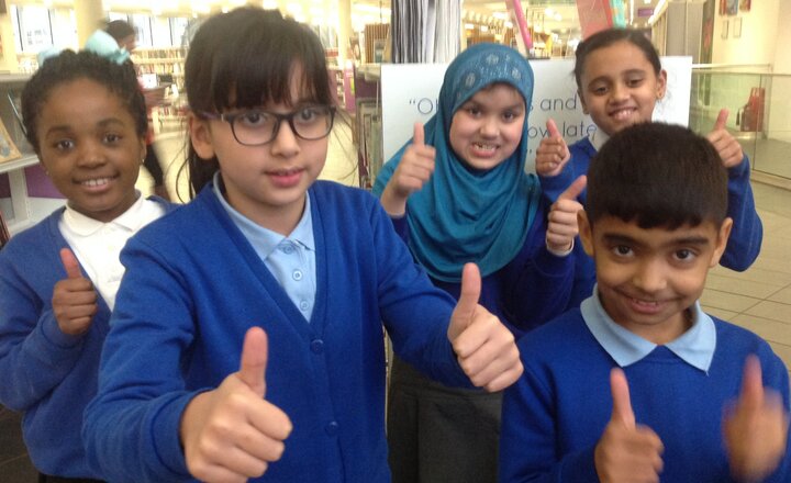 Image of Children from the Reading University visit the central library