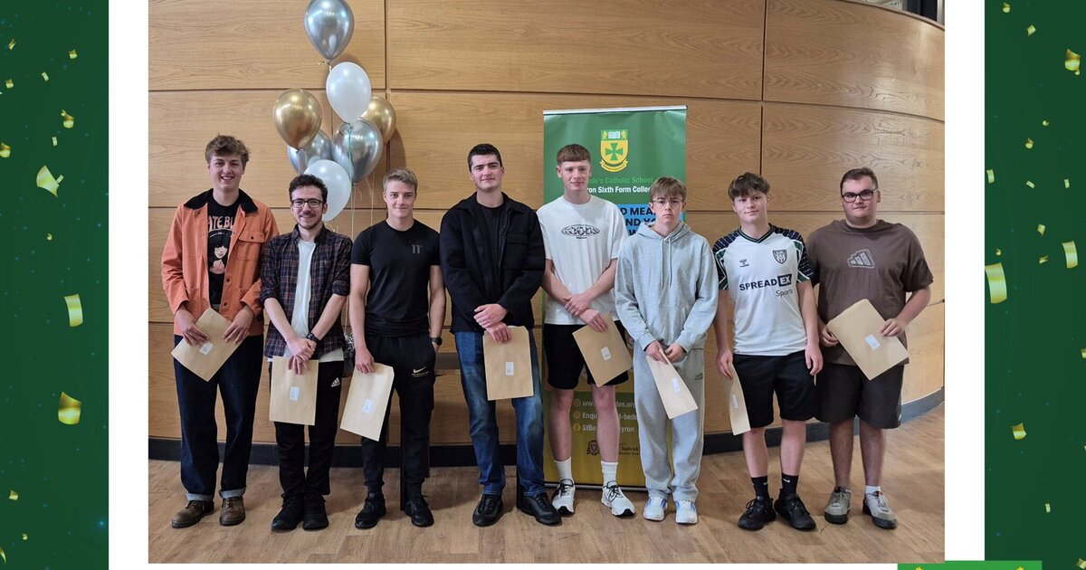 Proud A level students celebrate the results of their hard work