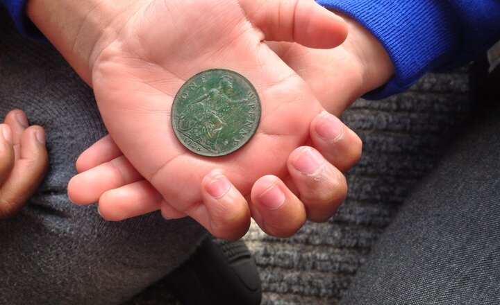 Image of Children’s excitement at ‘treasure’ find during nursery construction