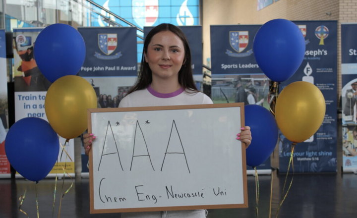 Image of Delighted A level students celebrate the results of their hard work
