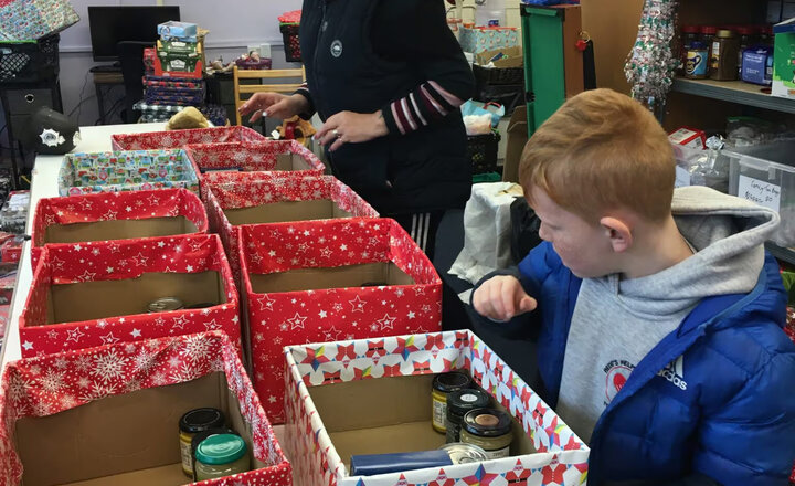 Image of Happy Jarrow schoolboy wins trophy for providing a helping hand at food bank