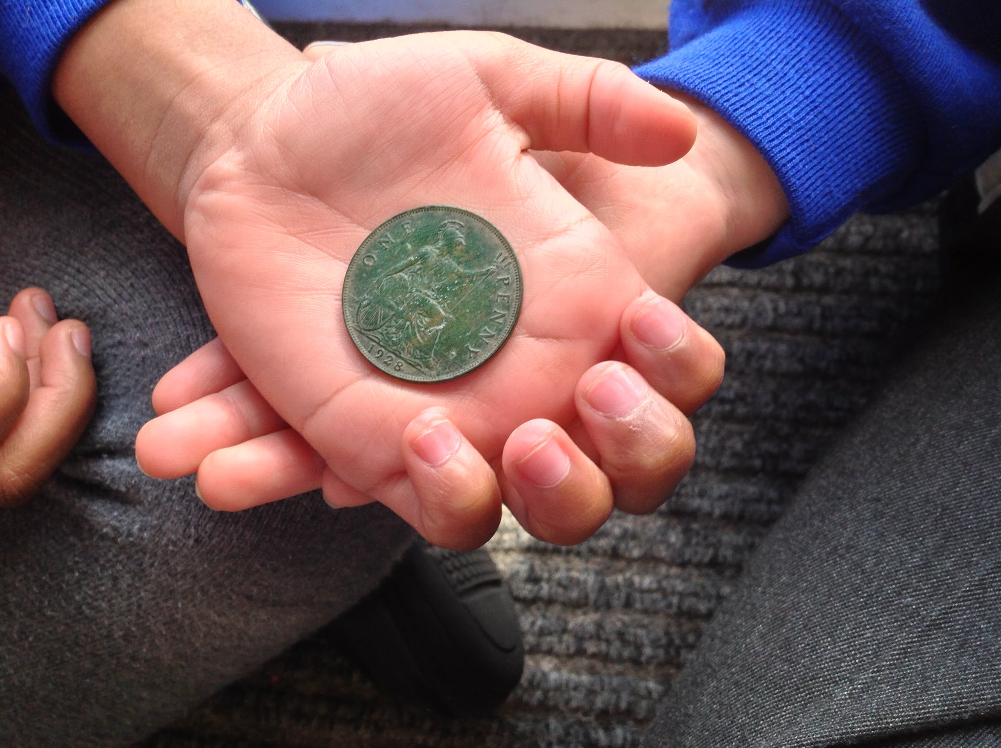 Image of Children’s excitement at ‘treasure’ find during nursery construction