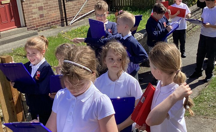 Class 3 exploring their local area to observe what's around them