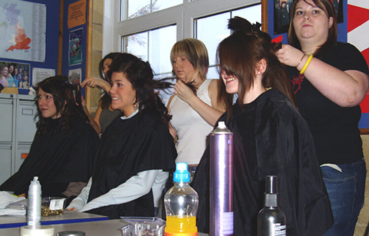 Image of Backstage action at the November Fashion Show