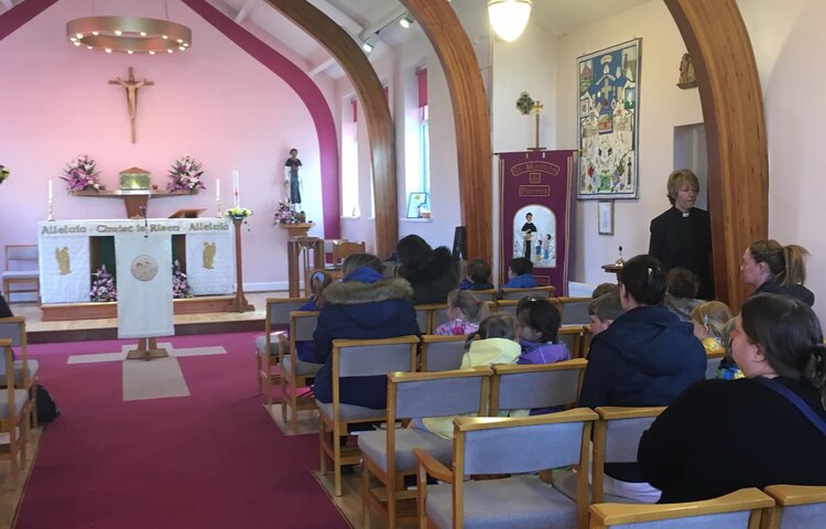 Image of Ducklings visit the church