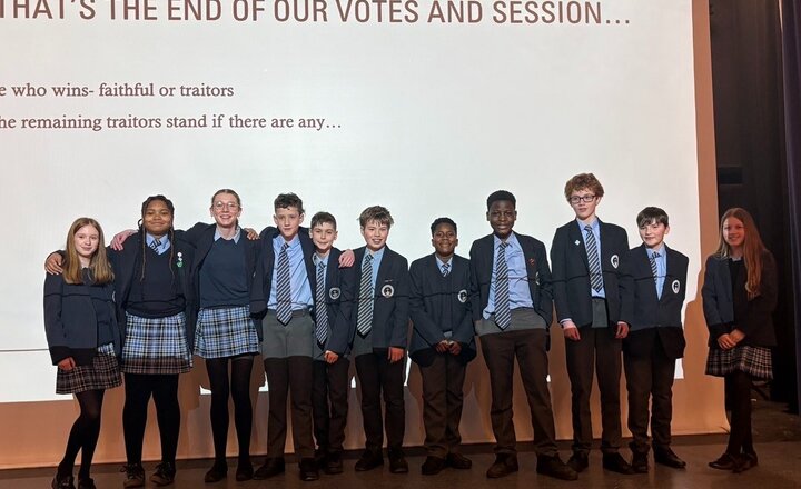 Carmel students together to celebrate the end of their Traitors game