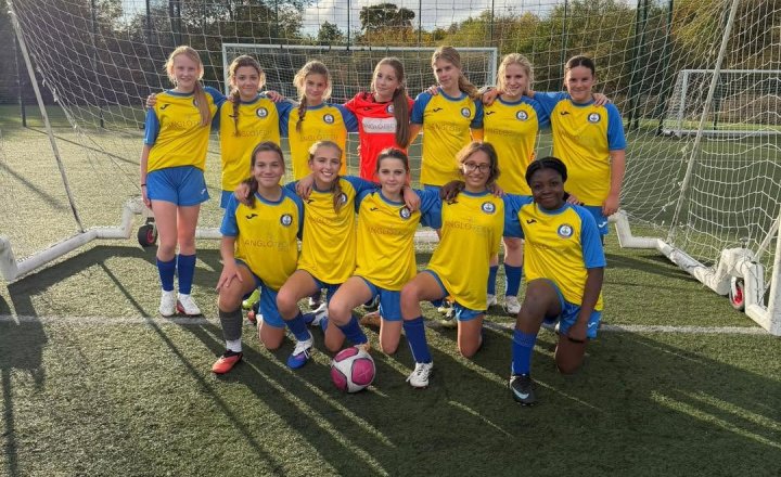 Carmel College U13 Girls' Football Team together for a group photo