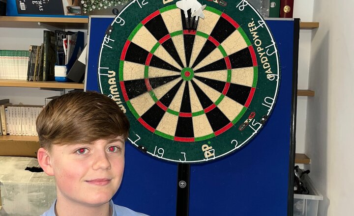 Carmel College Darts Club member with their excellent  scores