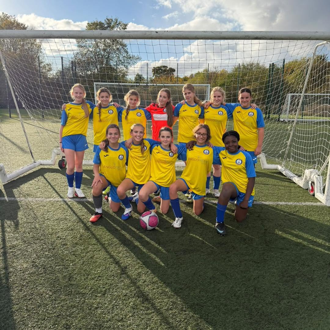 Carmel College U13 Girls' Football Team together for a group photo
