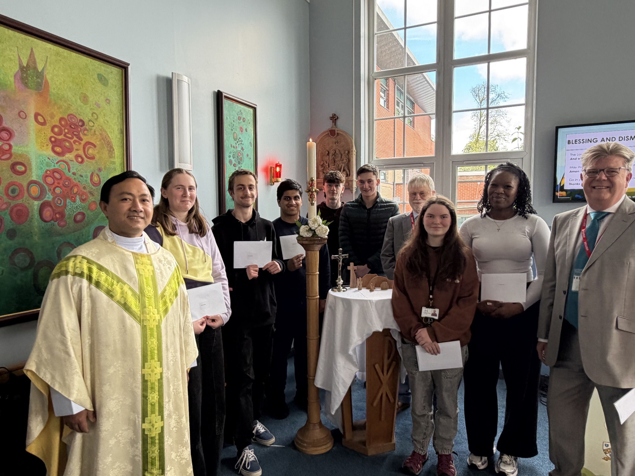 Carmel Sixth Form students presented with cheques to students preparing to travel to Peru