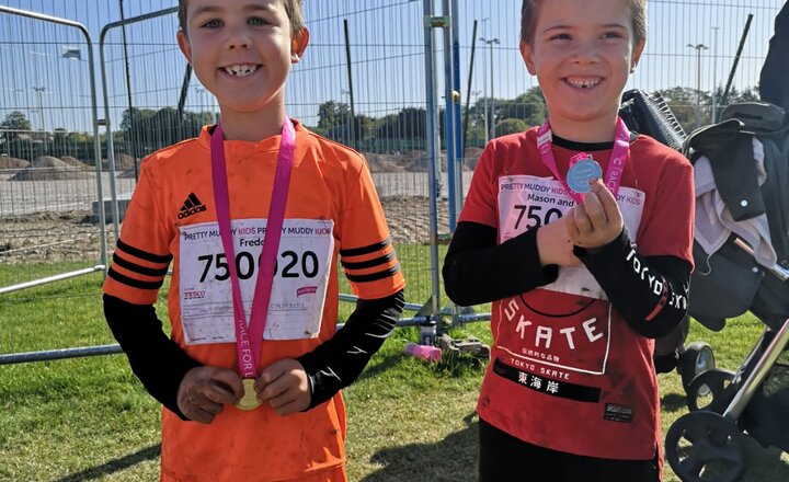 Image of Mason & Freddie get muddy for charity