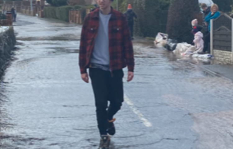 Image of Louis Helps Prevent Flooding Disaster for his Neighbours
