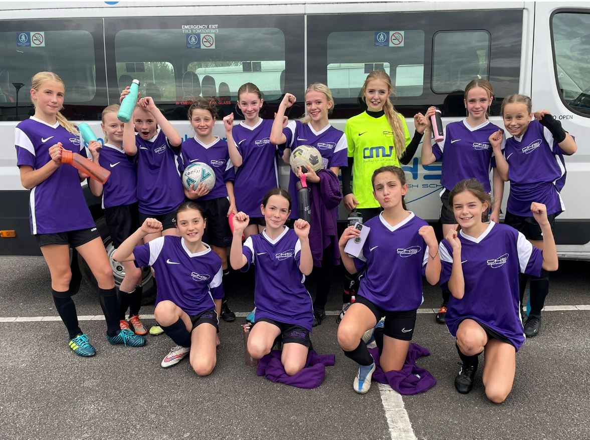 Image of Year 7 and 8 Footballers Celebrate Win in Manchester