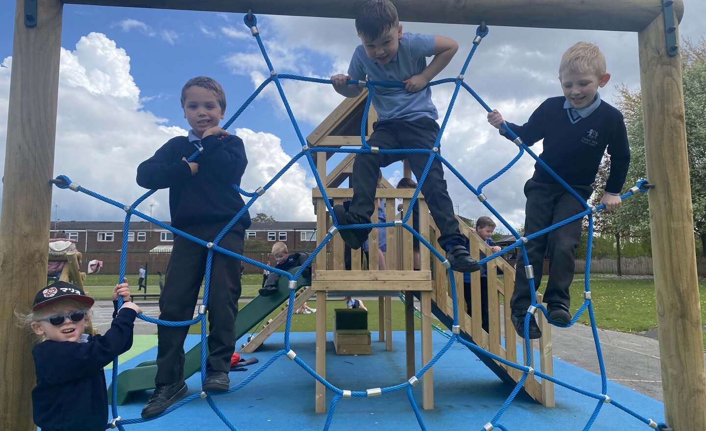 Image of Year 1 - Rain dodging on the playground!