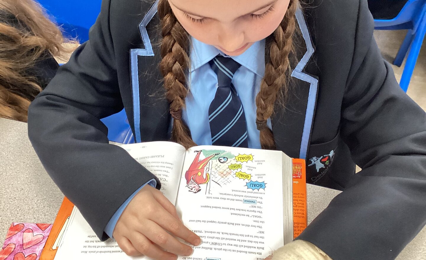 Image of Y5 enjoying their reading books