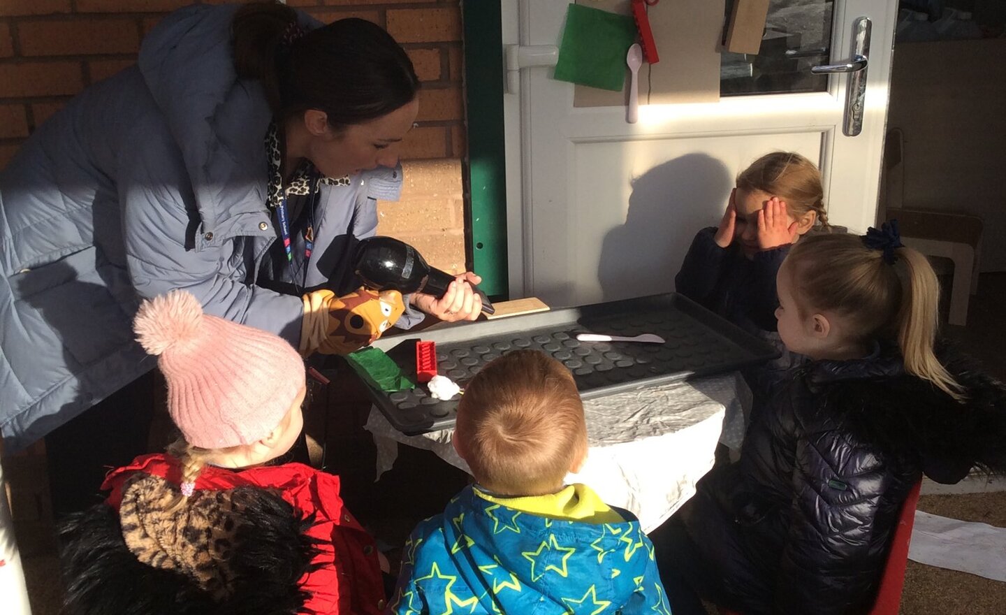 Image of Pre School-The Three Little Pigs wind experiment and house building at forest school