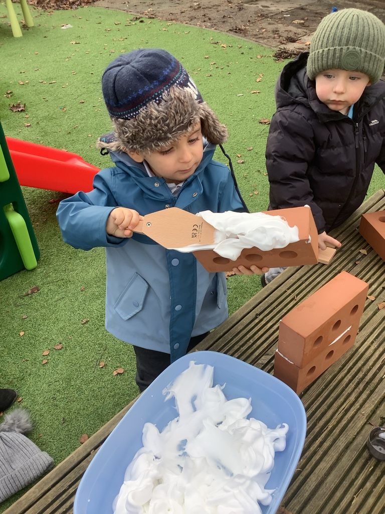 Image of Nursery 2s - Having A Go!