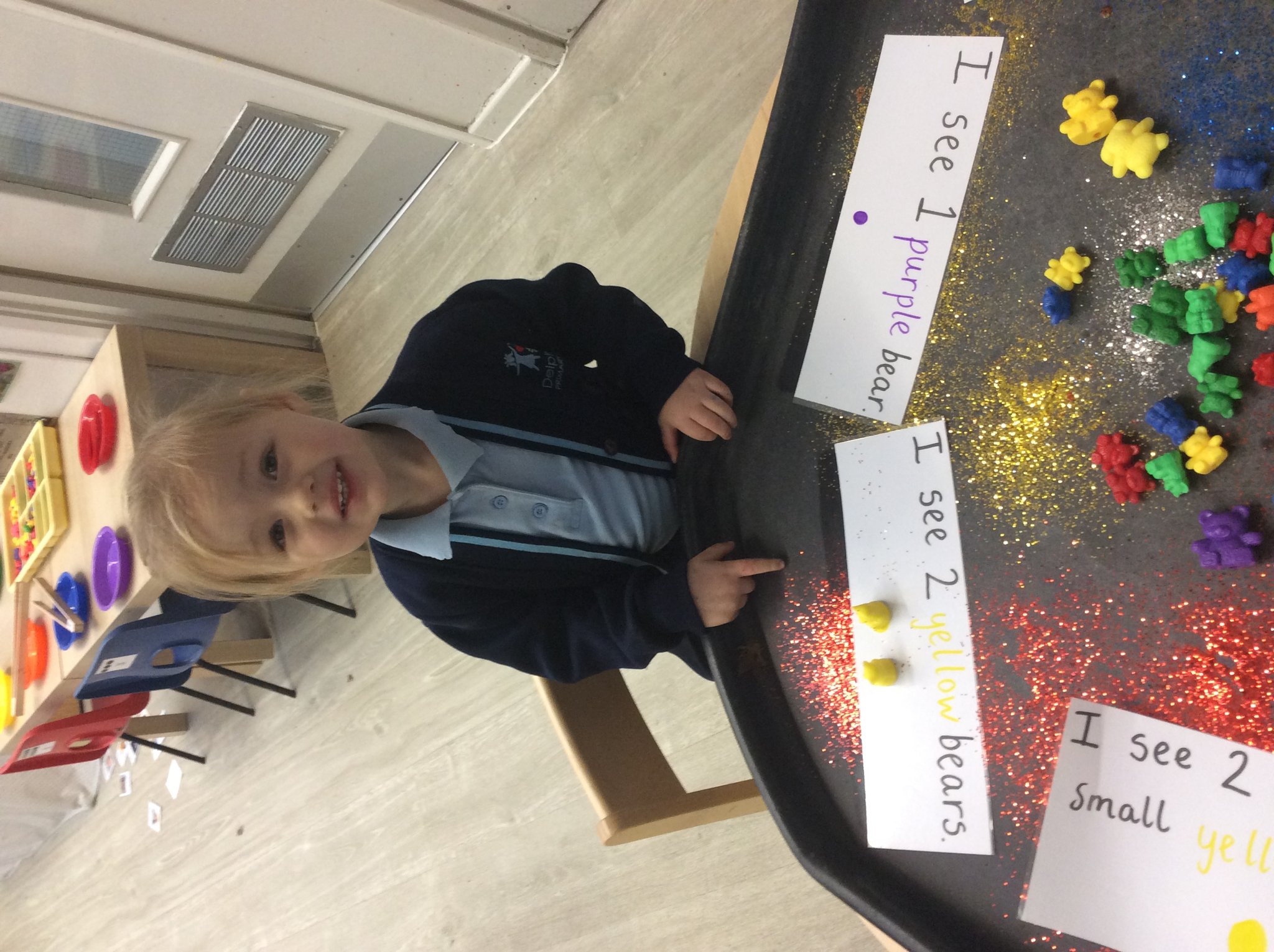 Image of Pre school-- exploring 2D shapes and categorising objects by colour