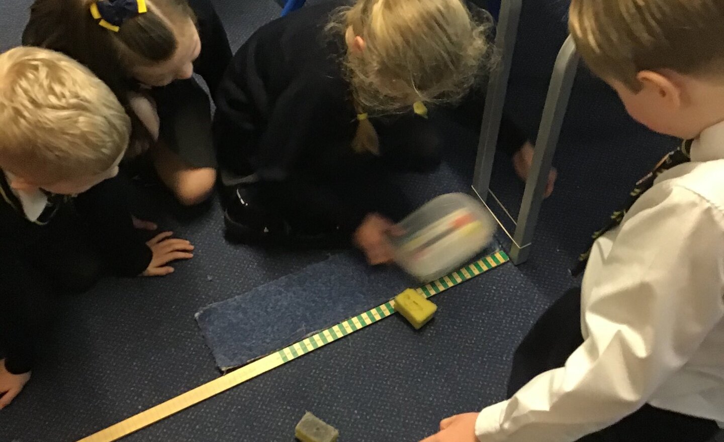 Image of Comparing how things move on different surfaces. 