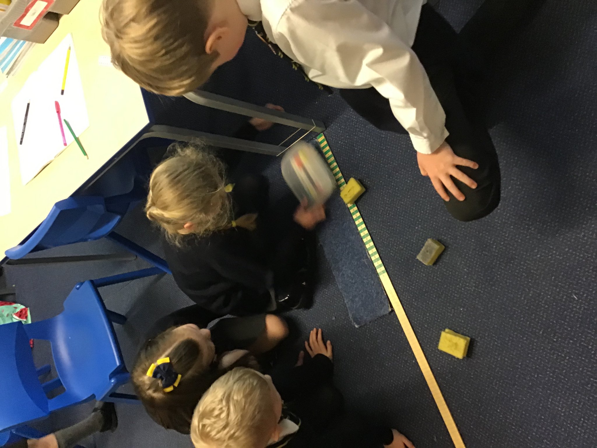 Image of Comparing how things move on different surfaces. 