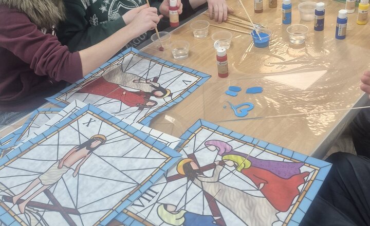 EM6 students painting for thie latest Stations of the Cross project