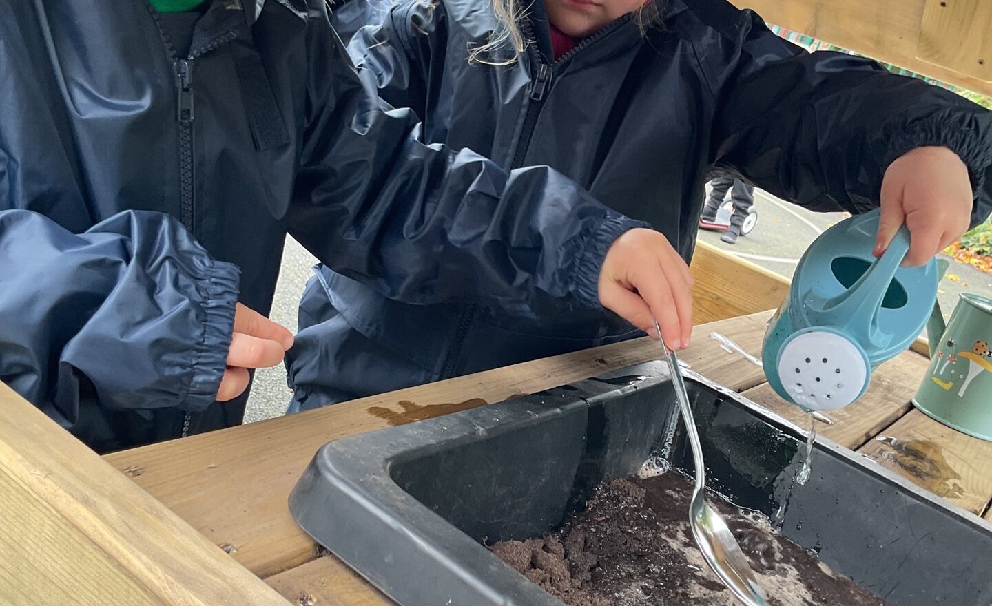 Image of Nursery Making Mud Soup