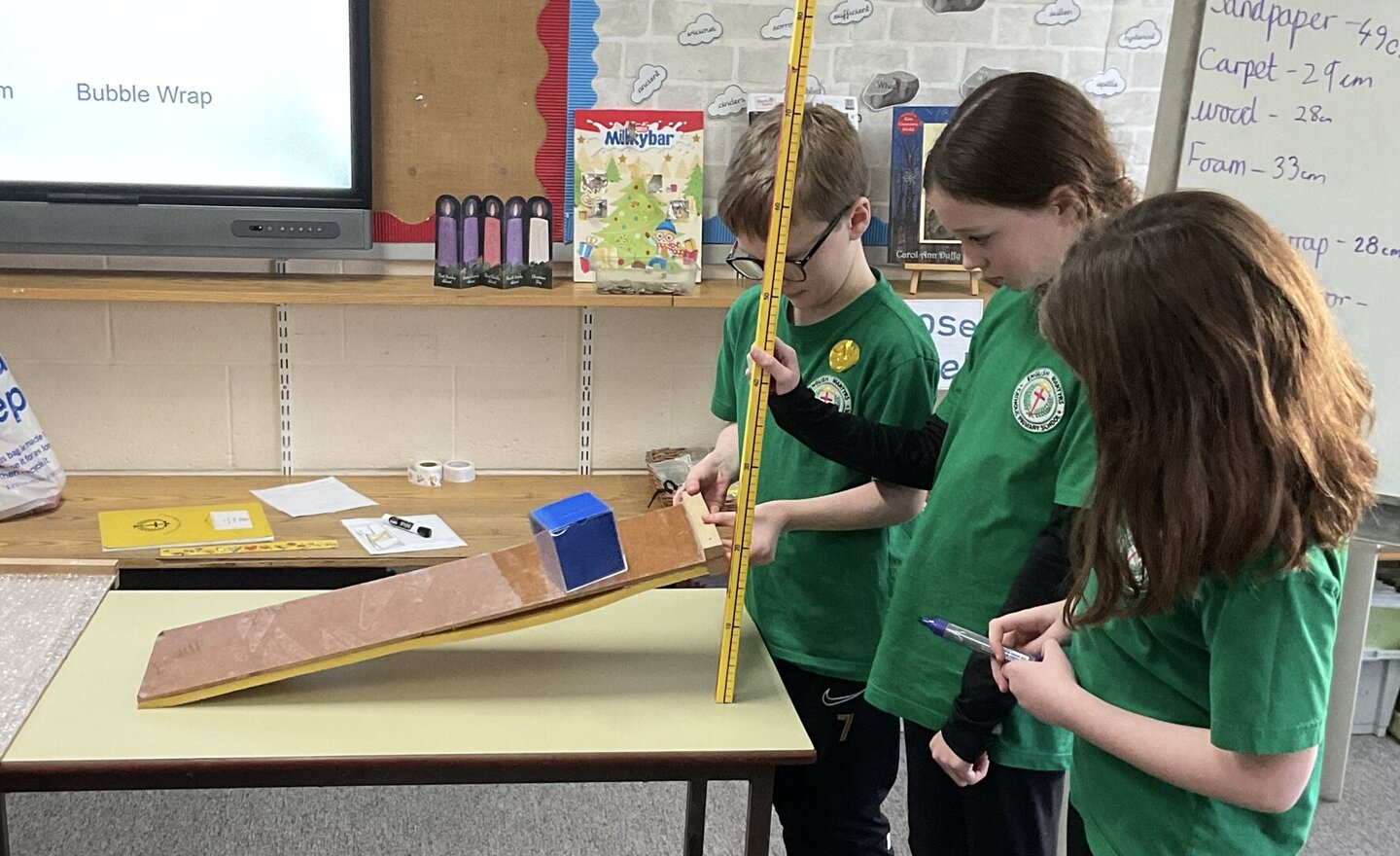 Image of Investigating the effects of friction on different surfaces.