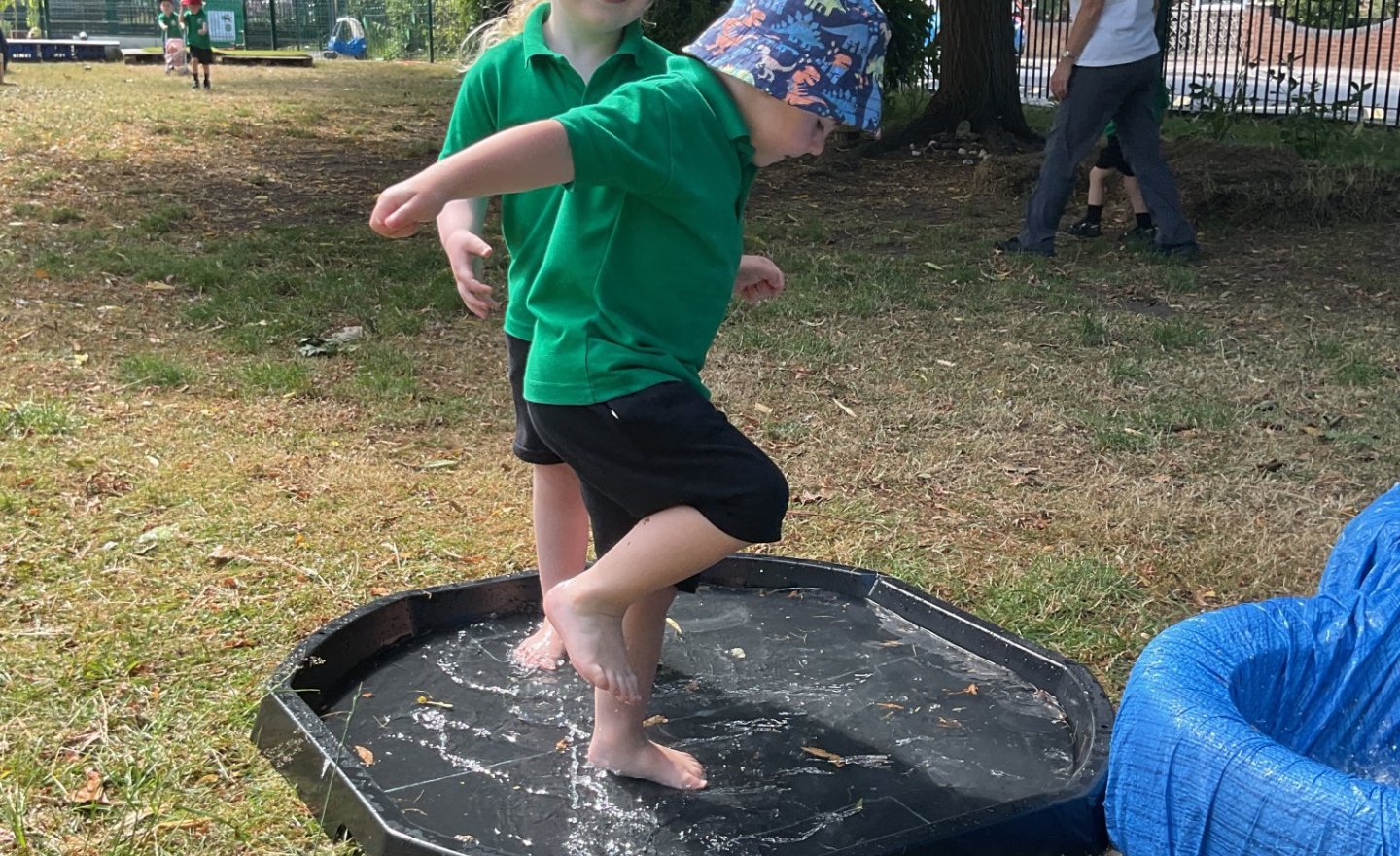 Image of Water Play in Nursery