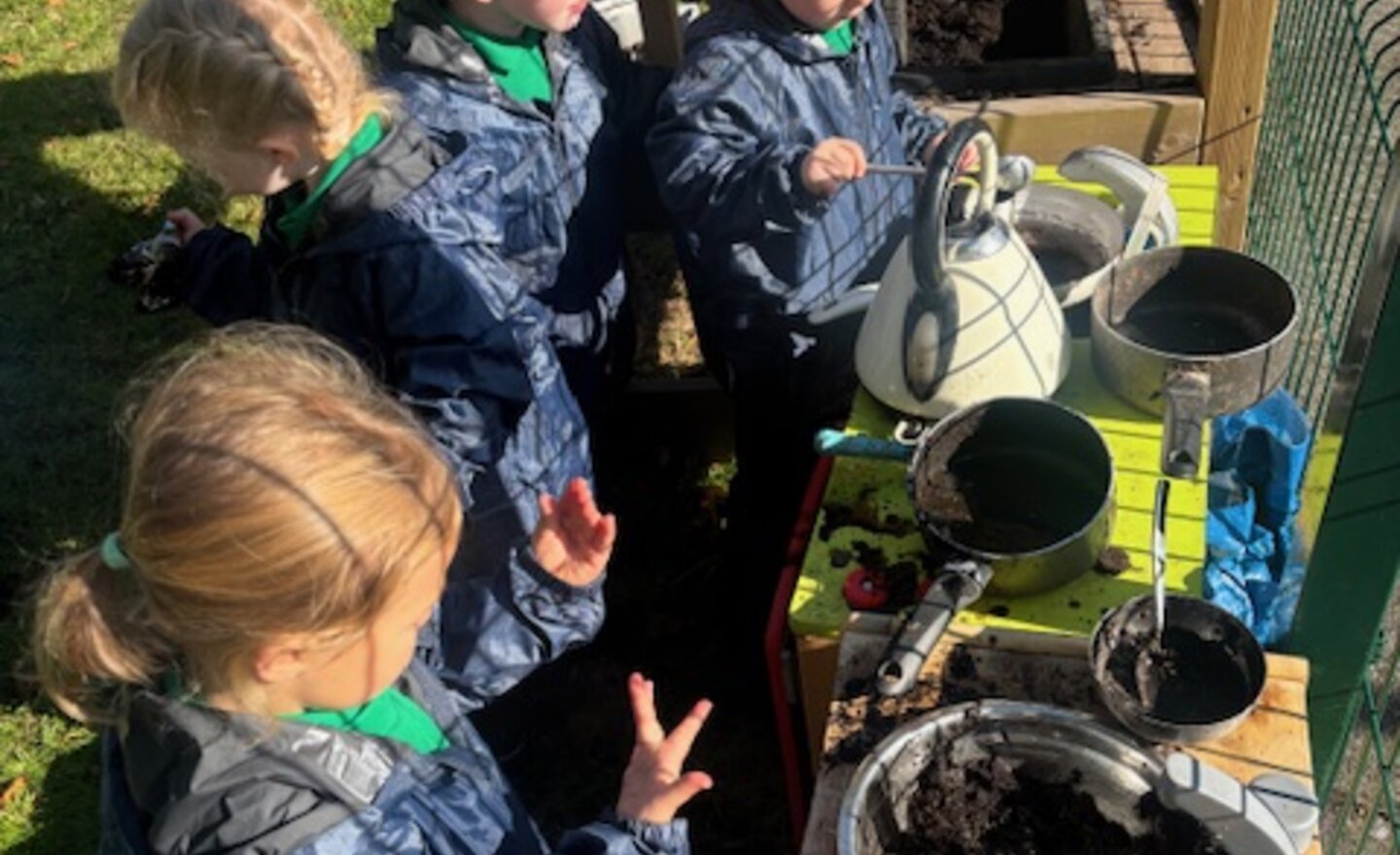 Image of Cooking in the Mud Kitchen