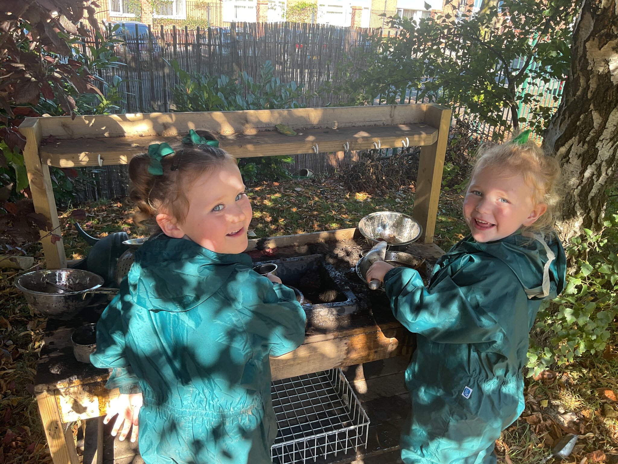 Image of Exploring our new mud kitchen