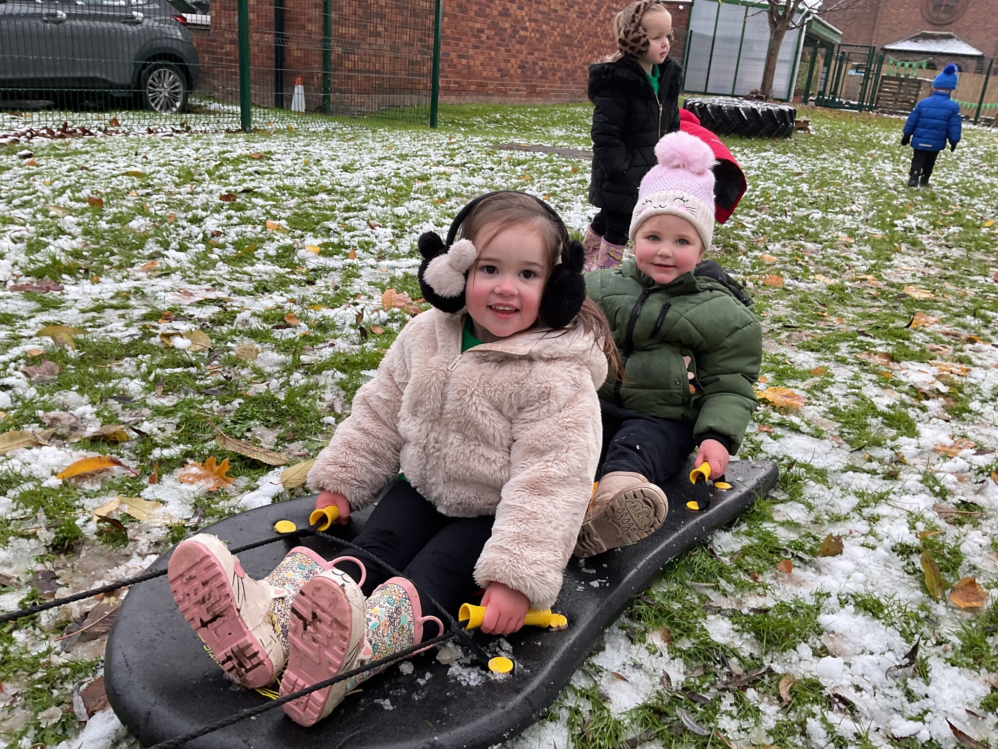 Image of Snow and sledging in Nursery A