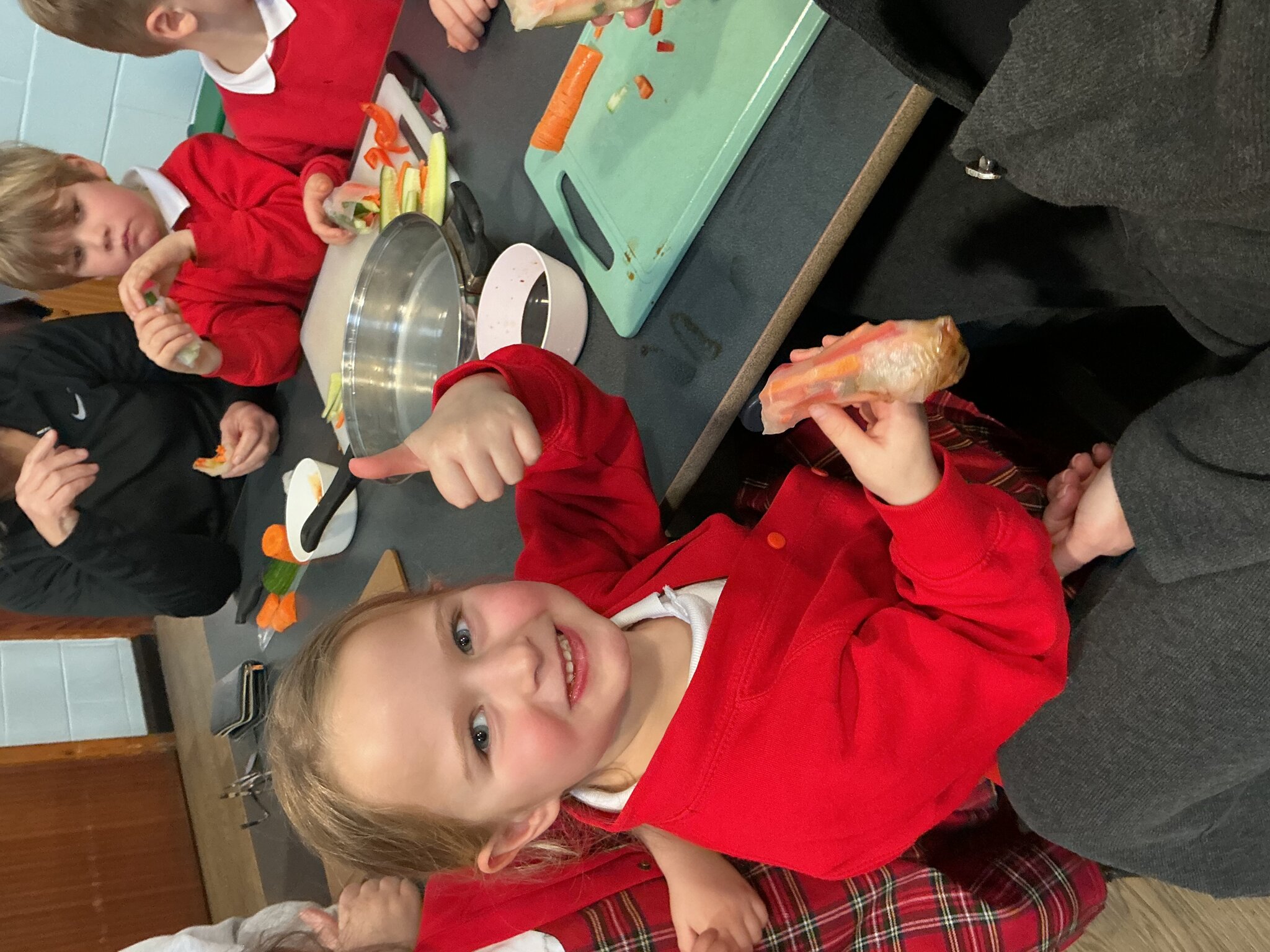 Image of Reception parents help us make healthy spring rolls